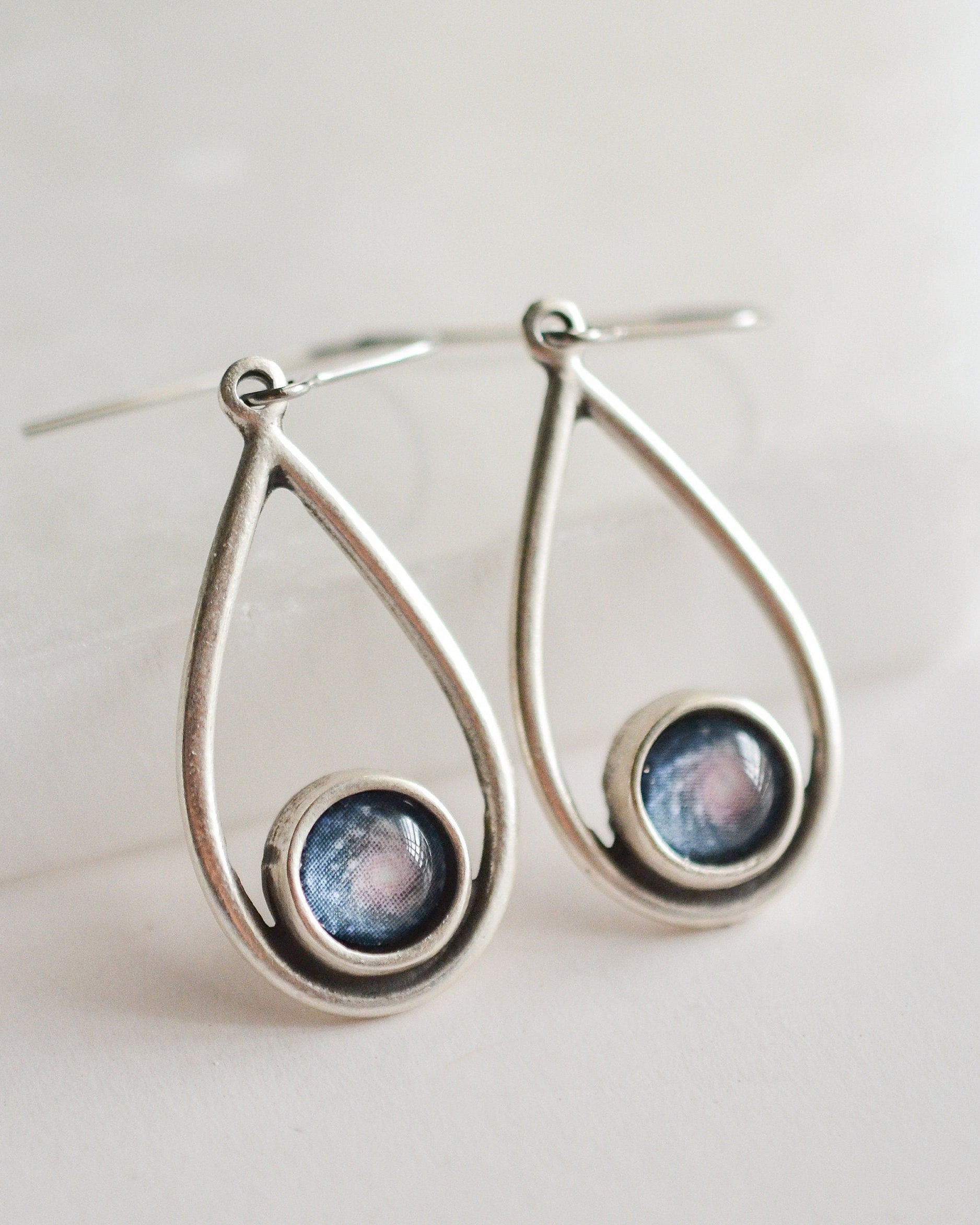 Silver teardrop earrings with galaxy printed domes