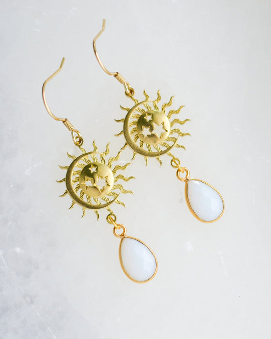 Brass sun moon and star  dangle earrings with pear shaped white iridescent stones